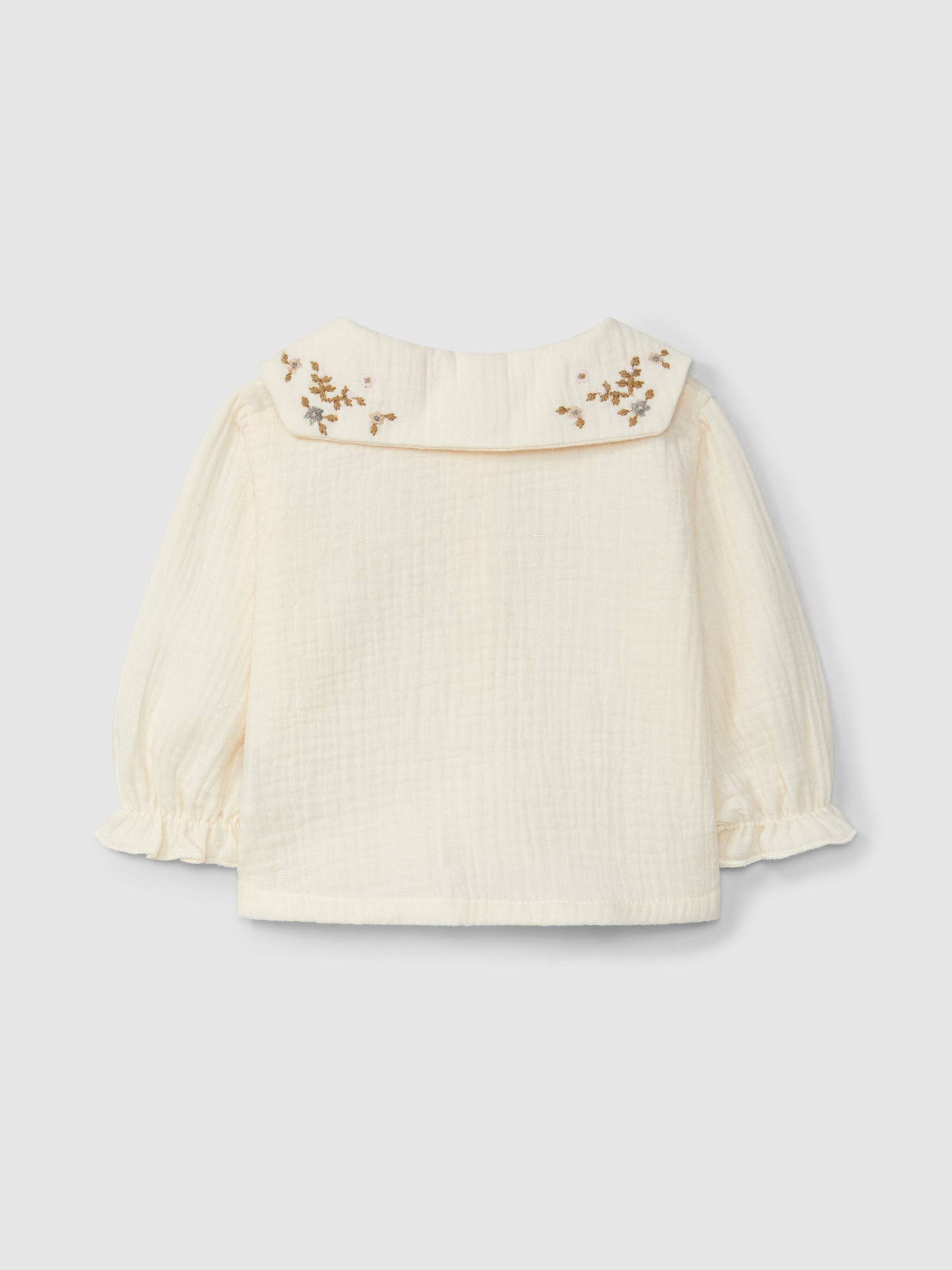 Blusa con ricamo floreale