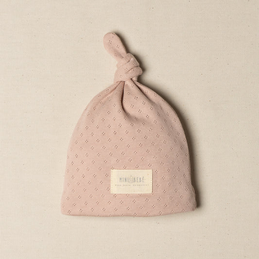 Cappellino rosa neonata con nodo 