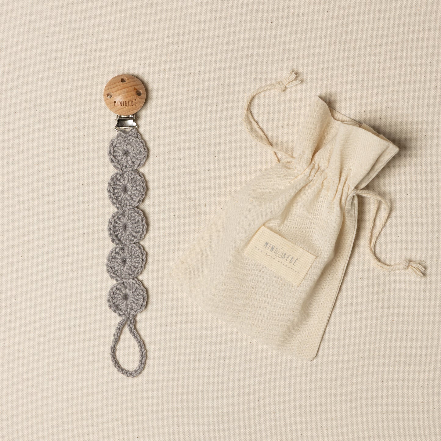 Catenella portaciuccio grigio per neonato 
Clip portaciuccio