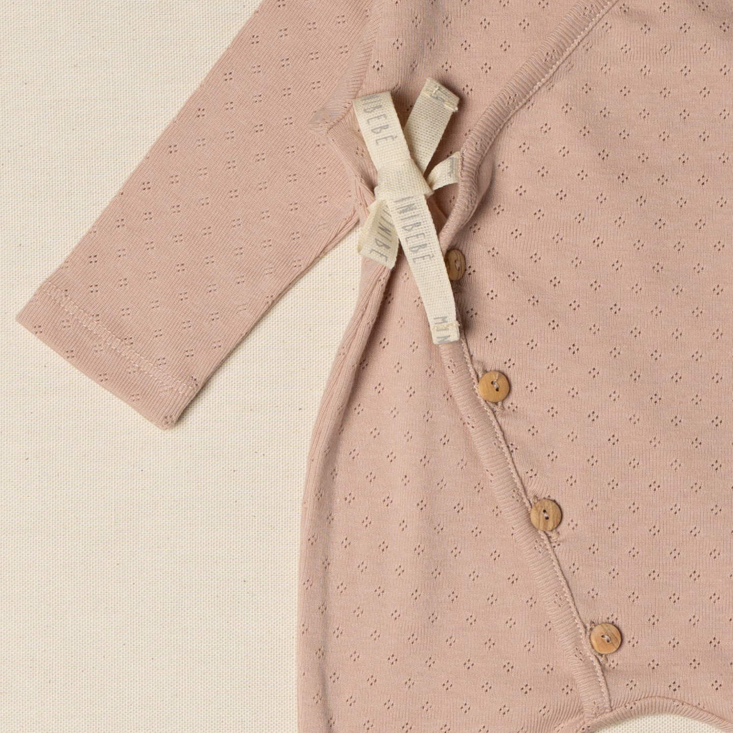 Tutina nascita incrociata rosa il cassetto del bebè