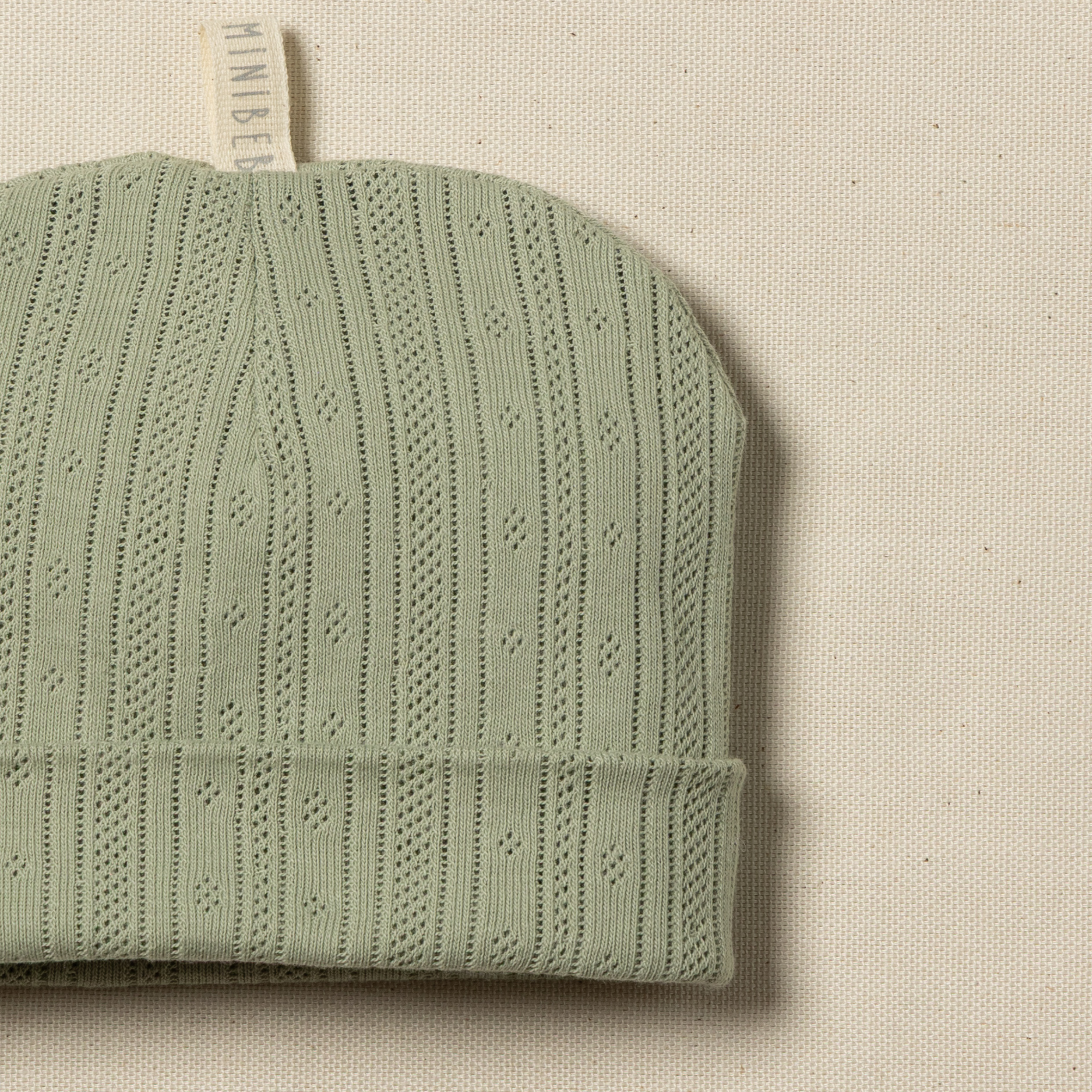 cappellino neonato traforato verde matcha
