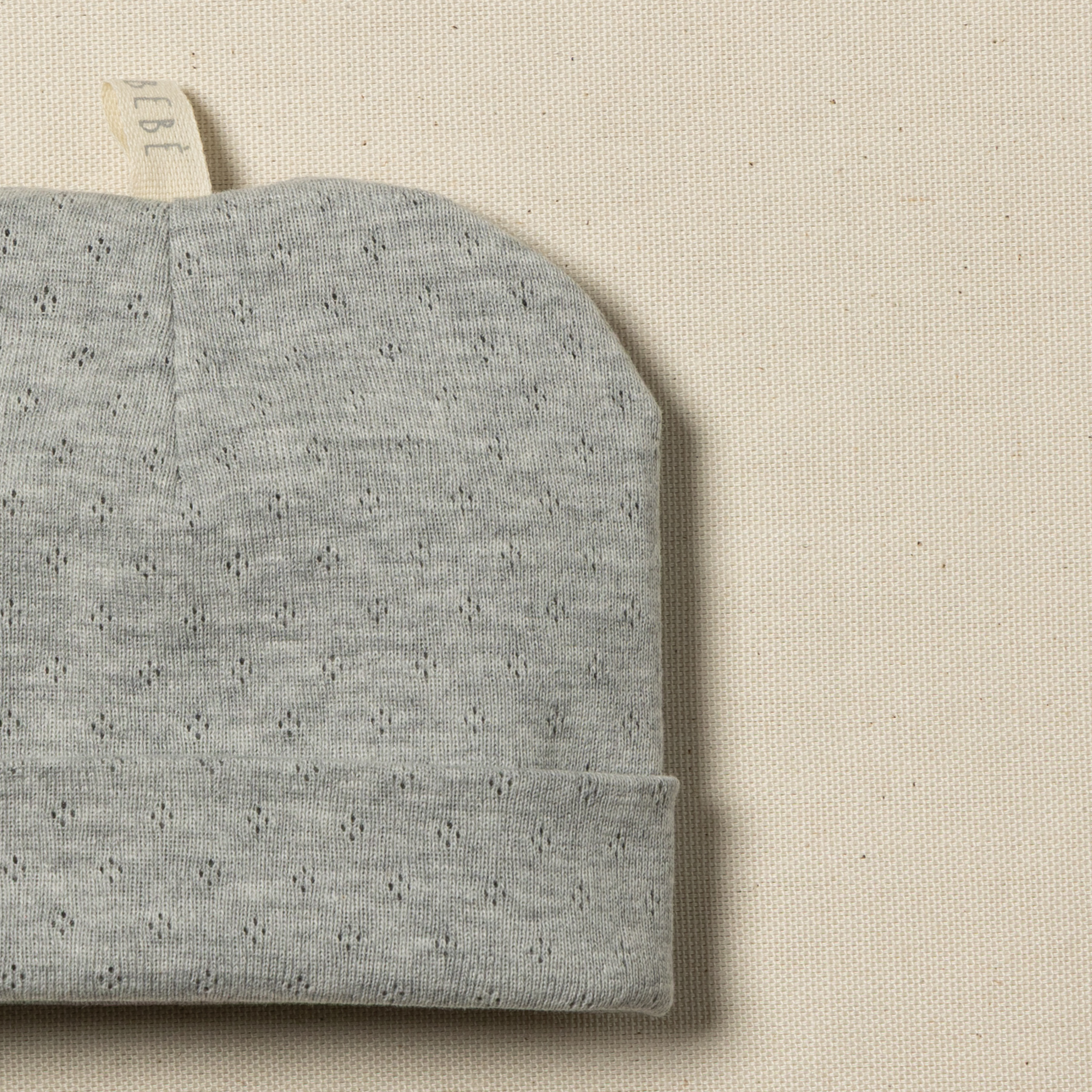 cappellino neonato grigio senza cuciture